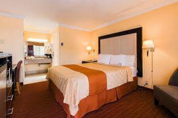 Surestay By Western Airport Motel