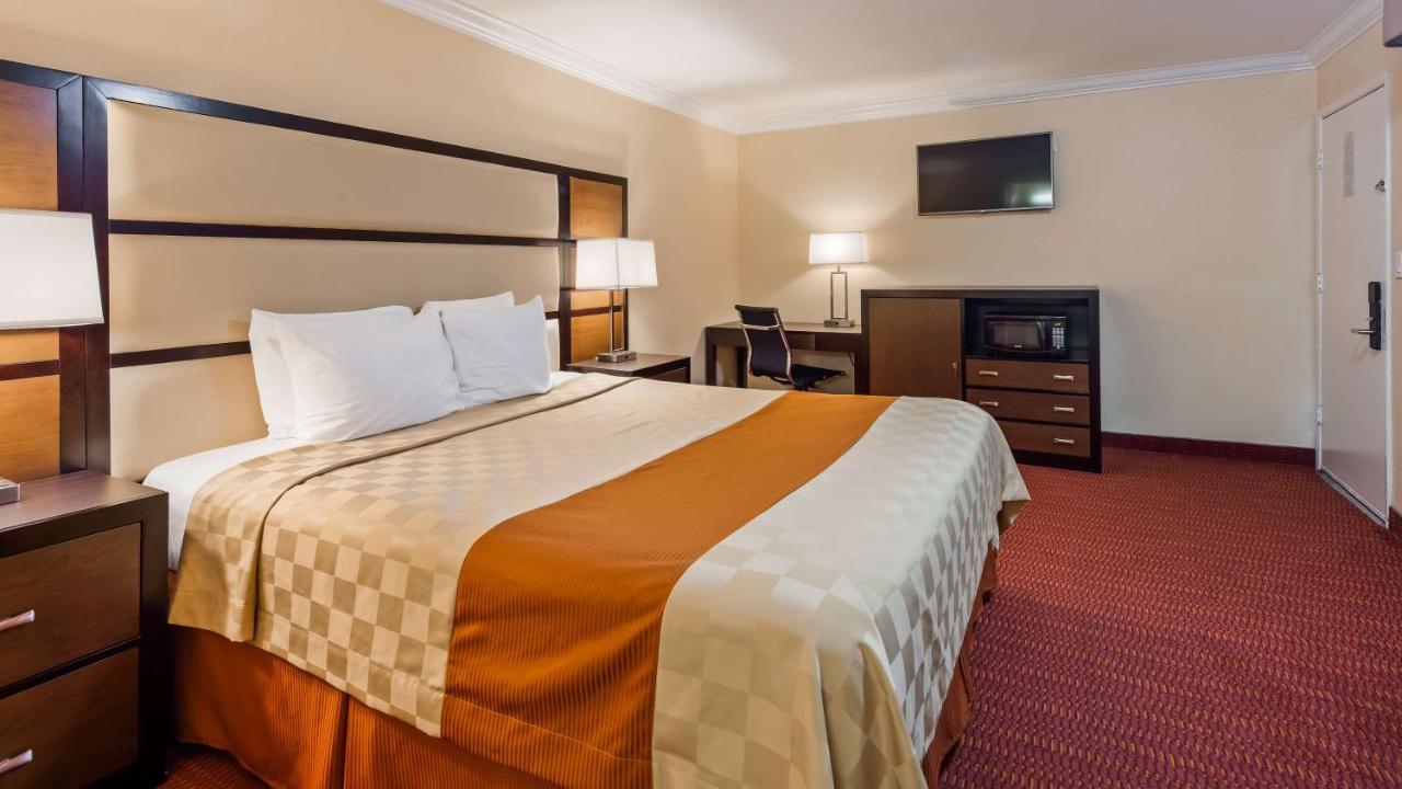 Surestay By Western Airport Motel