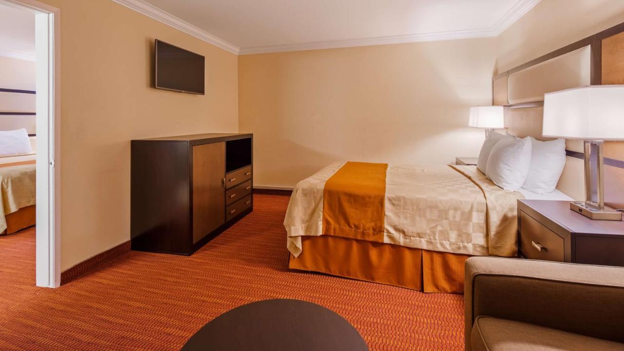 Surestay By Western Airport Motel